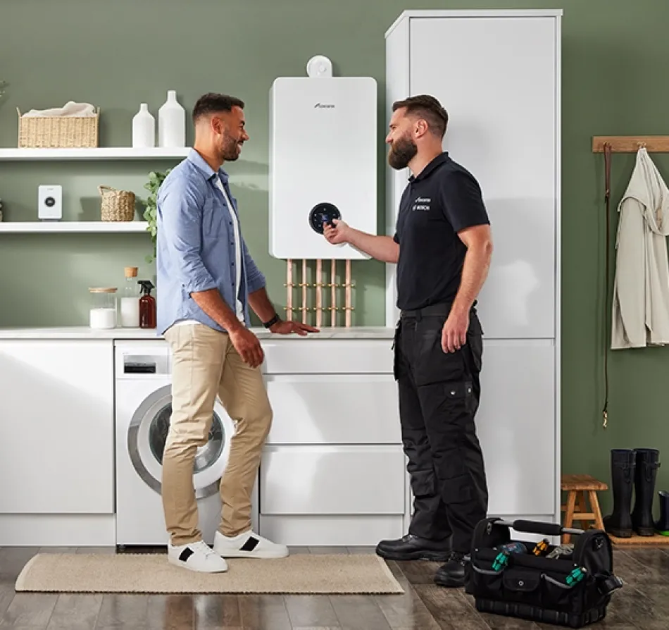 A modern home service interaction featuring a Worcester Bosch 8000 Utility boiler.